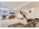 Modern basement with a TV, wet bar, and seating area, perfect for entertaining or relaxing at 4170 Vrain St, Denver, CO 80212