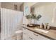 Modern bathroom features a stylish vanity and shower-over-bath at 4170 Vrain St, Denver, CO 80212