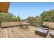 Outdoor patio featuring seating, a table, and lush trees, perfect for relaxation and entertaining at 4170 Vrain St, Denver, CO 80212