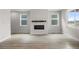 Bright and airy living room features hardwood floors and a sleek fireplace at 4543 Cholla Trl, Castle Rock, CO 80104