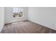 Neutral bedroom with plush carpeting and a large window offering natural light at 1131 Joseph Pl, Erie, CO 80026
