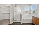 Bathroom features double sinks, soaking tub and separate shower with walk-in closet at 15378 E 99Th Way, Commerce City, CO 80022