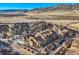 Extensive aerial view of the community set against a scenic mountain backdrop at 10056 W Unser Dr # 204, Littleton, CO 80127