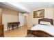 Charming bedroom with hardwood floors, complemented by antique furnishings and a peaceful ambiance at 21593 Hill Gail Way, Parker, CO 80138