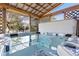 Back porch hot tub with privacy enclosure and clear water at 21593 Hill Gail Way, Parker, CO 80138