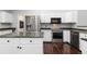 Full view of the kitchen featuring stainless steel appliances and an island at 21593 Hill Gail Way, Parker, CO 80138