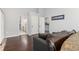 Open living room view of doorways to the hall and bathroom at 21593 Hill Gail Way, Parker, CO 80138