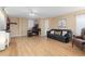 Spacious living room with modern decor, featuring sleek furniture, creating a comfortable and welcoming atmosphere at 21593 Hill Gail Way, Parker, CO 80138