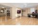 Expansive living area with modern lighting, a dedicated workspace, and ample space for relaxation and entertainment at 21593 Hill Gail Way, Parker, CO 80138