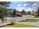 Neighborhood street featuring sidewalks and well-maintained homes at 21593 Hill Gail Way, Parker, CO 80138
