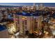 Stunning aerial view of the building in the evening with the city skyline in the background at 800 N Pearl St # 1211, Denver, CO 80203