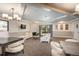 Relaxing lounge area boasts modern seating, TV, fireplace and views of the exterior common area at 800 N Pearl St # 1211, Denver, CO 80203