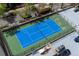 Aerial view of a blue and green on-property tennis court at 800 N Pearl St # 1211, Denver, CO 80203