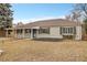 Charming home with well-maintained lawn, new roof, and a covered front porch at 956 Racine St, Aurora, CO 80011