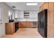 Light and bright kitchen with stainless steel appliances and butcher block countertops at 956 Racine St, Aurora, CO 80011