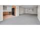 Open floor plan with view from living room to newly remodeled kitchen at 956 Racine St, Aurora, CO 80011