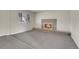 Cozy living room features fireplace, plantation shutters and neutral color scheme at 956 Racine St, Aurora, CO 80011