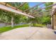 Relax in this backyard patio underneath the trellis and enjoy the natural beauty surrounding you at 1497 S Oakland St, Aurora, CO 80012