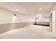 Large basement features recessed lighting, and carpeting, perfect for entertaining or relaxation at 1497 S Oakland St, Aurora, CO 80012