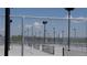 Outdoor pickleball courts enclosed with chain-link fencing under a clear sky at 11068 Eudora Cir, Thornton, CO 80233