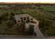 Beautiful exterior of a custom home nestled on a sprawling lot, showcasing the home's unique design at 6371 Diamond Ridge Pkwy, Castle Rock, CO 80108