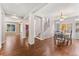 Bright dining area featuring hardwood floors, white trim and plenty of sunlight at 10550 Sedalia St, Commerce City, CO 80022