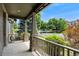 Inviting front porch with stone accents, offering a relaxing outdoor space at 10550 Sedalia St, Commerce City, CO 80022