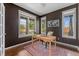 Cozy home office with hardwood floors, natural light and neutral decor at 10550 Sedalia St, Commerce City, CO 80022