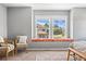 Charming window seat in the bedroom offers a cozy spot to enjoy natural light and neighborhood views at 10550 Sedalia St, Commerce City, CO 80022