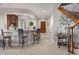 Finished basement with a bar area and a staircase leading to the upper level at 4541 Tierra Alta Dr, Castle Rock, CO 80104