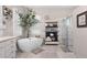 Elegant bathroom with a freestanding tub, marble accents, and a modern glass-enclosed shower at 4541 Tierra Alta Dr, Castle Rock, CO 80104