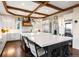 Elegant kitchen with double islands, stainless steel appliances, and ample counter space at 4541 Tierra Alta Dr, Castle Rock, CO 80104