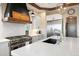 Stylish kitchen with stainless steel appliances, a large island, and modern finishes at 4541 Tierra Alta Dr, Castle Rock, CO 80104