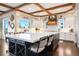 Gourmet kitchen featuring a large island, modern appliances, and custom cabinetry at 4541 Tierra Alta Dr, Castle Rock, CO 80104
