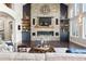 Inviting living room featuring a stone fireplace, hardwood floors, and elegant decor at 4541 Tierra Alta Dr, Castle Rock, CO 80104