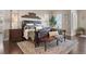 Serene main bedroom with hardwood floors, plantation shutters, and stylish decor at 4541 Tierra Alta Dr, Castle Rock, CO 80104