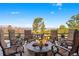 Outdoor seating area with a fire pit, with breathtaking views of the surrounding landscape at 4541 Tierra Alta Dr, Castle Rock, CO 80104