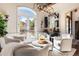 Relaxing wine room with French doors leading to the backyard at 4541 Tierra Alta Dr, Castle Rock, CO 80104