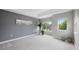 Spacious primary bedroom with tray ceilings, natural light and neutral tones at 8307 S Garland Cir, Littleton, CO 80128
