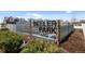Beeler Park signage at entrance with landscaping in front and townhomes in the background at 5716 Boston Ct, Denver, CO 80238