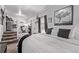 Bright and airy bedroom featuring a cozy bed, study area, and natural light for versatile living at 2281 Oak Pl, Thornton, CO 80229