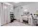 Bright bedroom featuring a vanity table, plush rug, and soft décor for a stylish, relaxing space at 2281 Oak Pl, Thornton, CO 80229