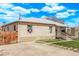 Single-story home featuring a long driveway and lush lawn at 2281 Oak Pl, Thornton, CO 80229