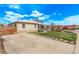 Single-story home featuring a concrete driveway and a well-maintained lawn at 2281 Oak Pl, Thornton, CO 80229