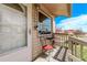 Intimate front porch setting with cozy seating, perfect for morning coffee or evening chats at 2281 Oak Pl, Thornton, CO 80229