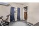 Home gym featuring an elliptical trainer and natural light, creating an ideal space for fitness at 2281 Oak Pl, Thornton, CO 80229