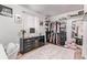 Spacious walk-in closet featuring closet organizers, shelving, and natural light for organized living at 2281 Oak Pl, Thornton, CO 80229