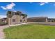 Expansive backyard with lush green lawn and a charming patio for outdoor entertaining at 12835 Randles Ave, Parker, CO 80134