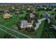 A scenic aerial view of a home with a sprawling lawn in a community with rolling hills at 485 Sapphire Dr, Castle Rock, CO 80108