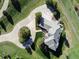 Stunning aerial view of property showcasing the circular driveway and landscaping, nestled on a large lot at 485 Sapphire Dr, Castle Rock, CO 80108